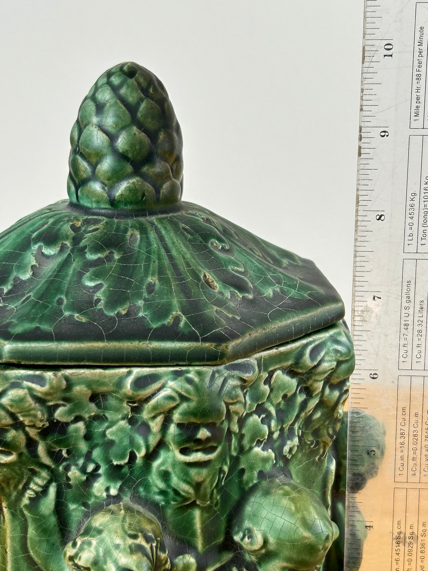 c1900 ATLANTIC POTTERY Octagonal Figural HUMIDOR TOBACCO JAR w/ CHERUBS, FACES