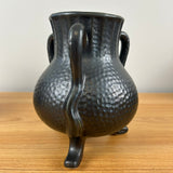 Camark Art Pottery Black Gun Metal Glaze Dimpled Surface Three Legged Handled Vase