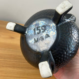 Camark Art Pottery Black Gun Metal Glaze Dimpled Surface Three Legged Handled Vase