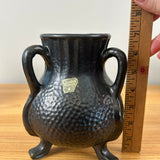 Camark Art Pottery Black Gun Metal Glaze Dimpled Surface Three Legged Handled Vase