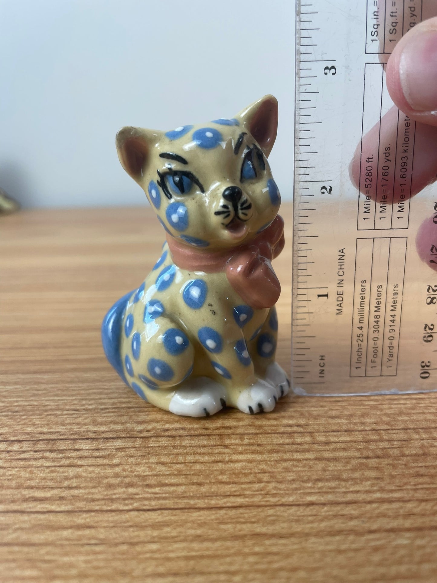 Vintage CERAMIC ARTS STUDIO Yellow Cat Figurine Blue Polka Dots 2.75"" Tall USA