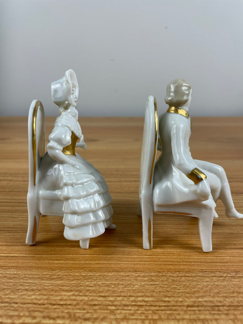 Capodimonte Figurine Colonial Man & Woman Sitting In Chairs Reading Gold Accents