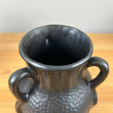 Camark Art Pottery Black Gun Metal Glaze Dimpled Surface Three Legged Handled Vase